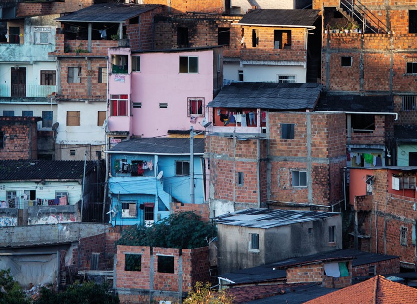 Scantily-built favelas line the Salvadorian landscape